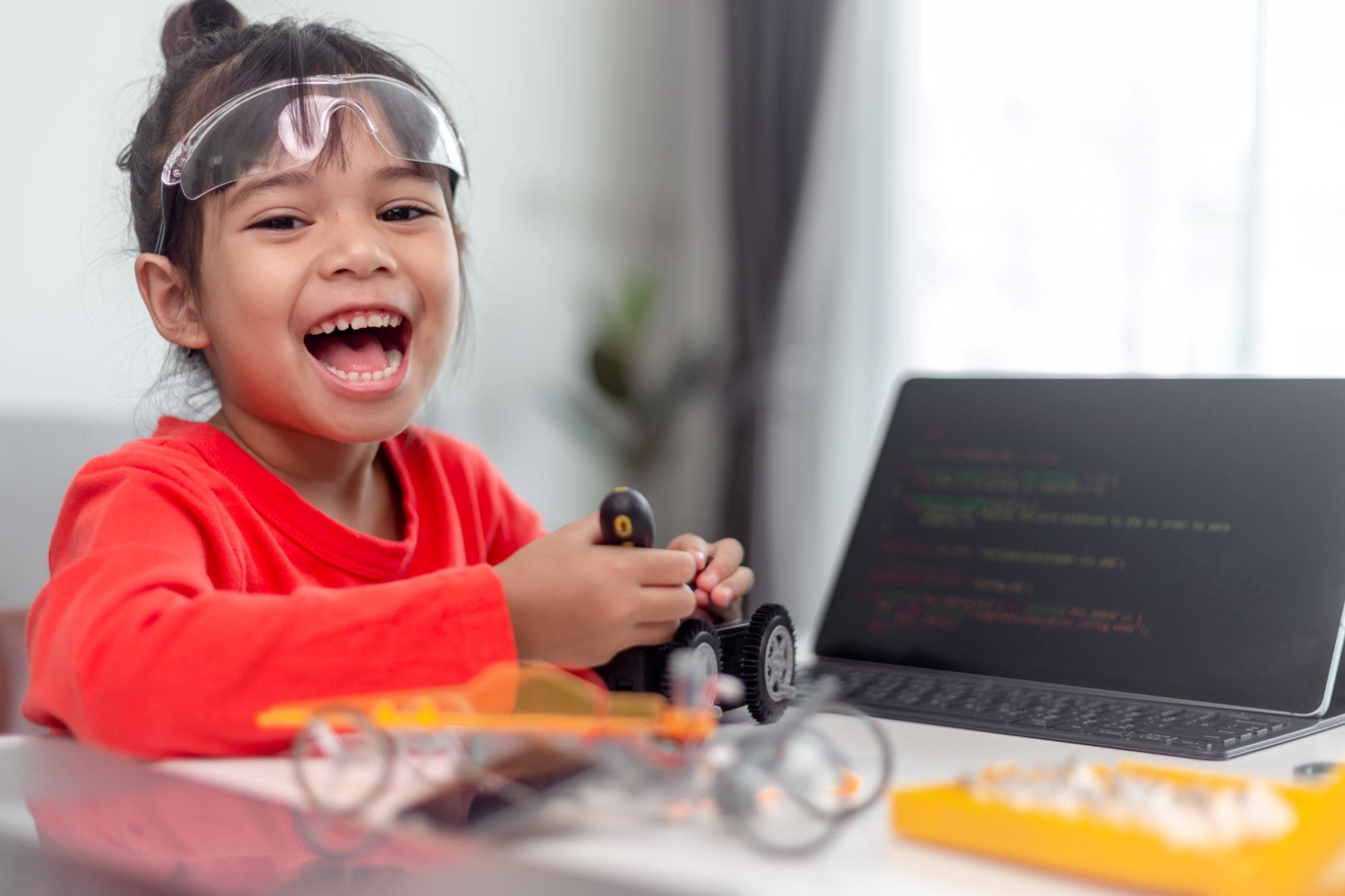 girl programming a robot